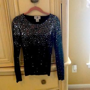 Black and silver lame’ sweater. Perfect for holidays! Like new!